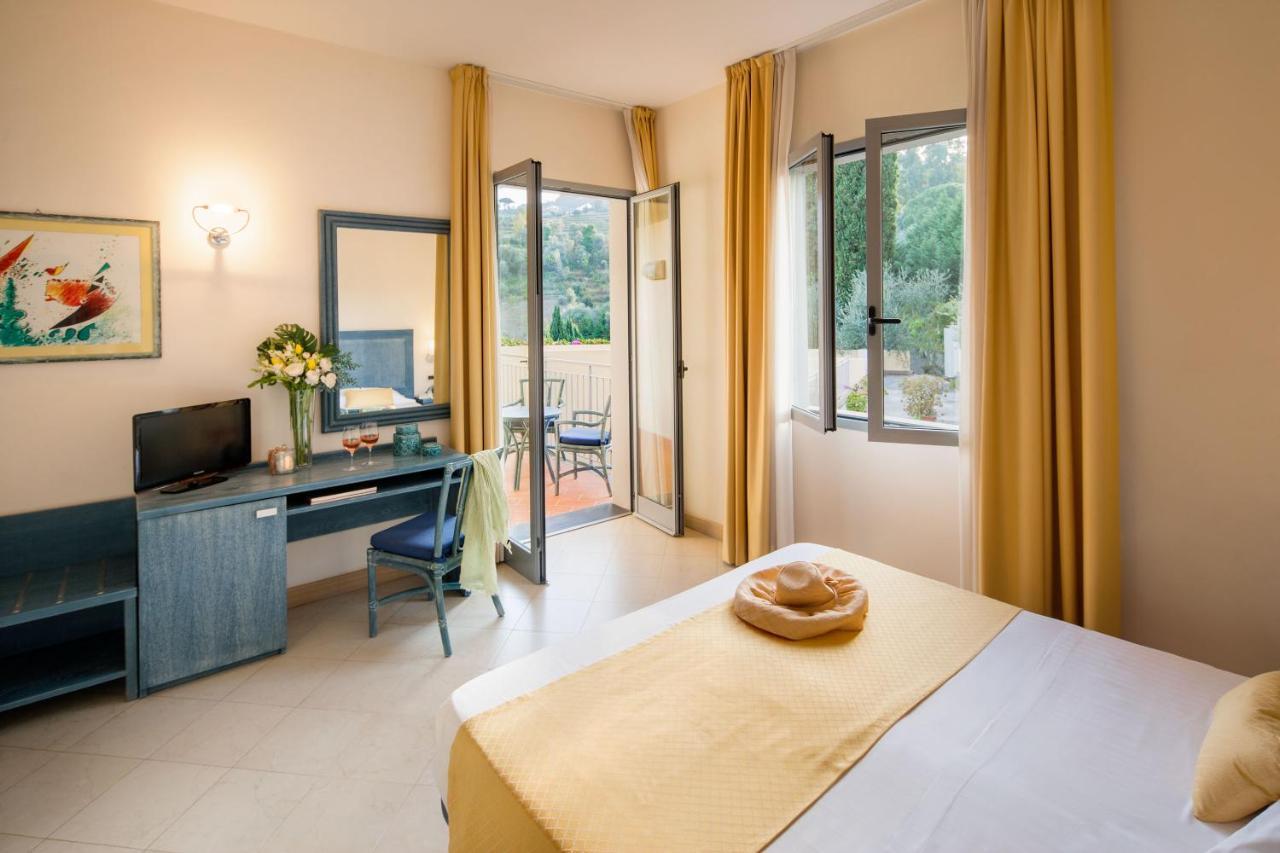 Hotel Metropol Diano Marina Quarto foto